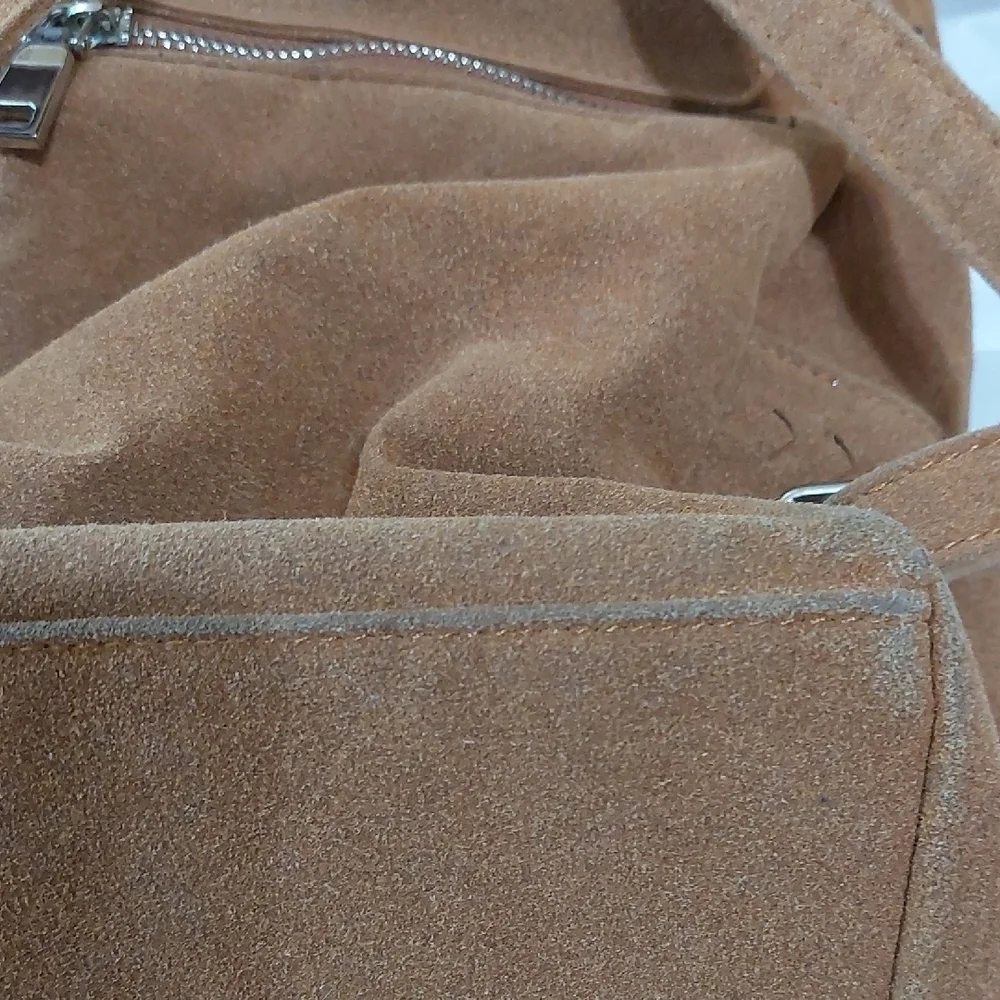 Elegant Tan Suede Backpack with Tassel Accents